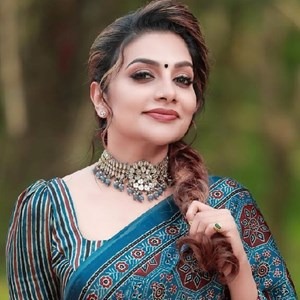 Rimi Tomy